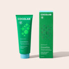 Cocolab Cocoshine toothpaste tube and packaging on a light gray background